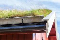 Torvstokk-krok Platon, torvstokkholder ved takfot